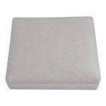 Rue Ottoman in light neutral fabric with feather-fill seat and rubber wood base on subtle wooden legs