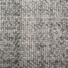 Extreme close-up emphasizing gray and cream twill weave texture