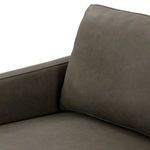 Close-up shot of a single back cushion on the Vanna Sofa emphasizing its plumpness and leather surface