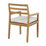 Three-quarter rear angle showing chair with white cushion and slatted teak backrest