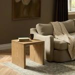 Hathaway End Table styled next to beige sofa and placed on patterned rug in living room