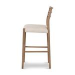 Side profile highlighting the slightly curved wooden backrest and cushioned seat thickness