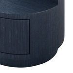 Close-up of bottom drawer corner showing textured selvage blue finish