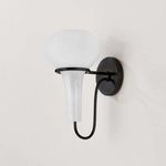 Adams Corner sconce side view showing metal J-arm curve and pear-shaped glass shade