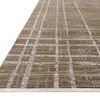 Close-up angled view showing rug's pile texture and white fringed edging on short side