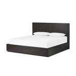 Leo Bed shown from a three-quarter angle highlighting bed frame depth and headboard reed texture