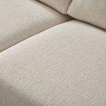 Extreme close-up of the tightly woven basketweave texture on the seat cushion