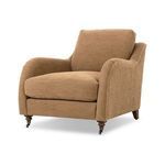 Lynne chair angled view highlighting curved arm profile and angled back legs