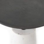 Close-up view of matte grey hammered iron tabletop surface and raised edge