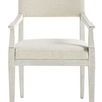Ridge Dining Arm Chair with light wood frame and beige upholstered seat and back, featuring clean, structured arms