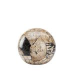 Large decorative sphere crafted from polished petrified wood with natural beige, black, and brown patterns