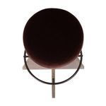 Top-down view showing the full circular plum velvet seat and metal footrest below