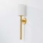 Lakeport Wall Sconce in Aged Brass with vertically fluted tail, stacked decorative spheres, and white cylindrical shade