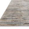 Low angle close-up of Soho Multi / Dove Rug’s edge showing slight pile texture