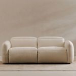Eli Power Recliner sofa in styled living room with beige wall and carpet