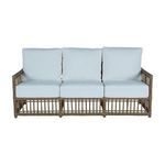 Outdoor sofa front view showing three white cushion seats and back pillows