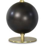 Close-up of the spherical blackened metal body and brass base of Grant Mini Lamp