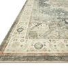 Close-up angled view showing plush texture and muted floral border on Rosette Slate / Ivory Rug