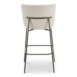 Back view of Early stool showing horizontal metal bar supporting upholstered backrest