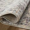 Close-up of rolled corner highlighting dense texture and weave detail of the Sorrento Mist Charcoal rug