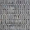 Detailed view of diamond shapes and multiple shades of gray on Beckett rug surface