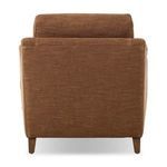 Back view of Lynne Chair in brown fabric showing clean lines and tapered wood legs without casters