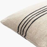 Close-up angled view showing textured linen-cotton fabric and detailed black stripe stitching