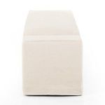 Bench with natural lighting highlighting fabric texture and slipcover craftsmanship