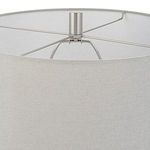 Interior view of lamp shade showing polished nickel spider fitter and light gray fabric