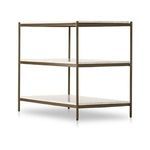 Angled macro view of marble corner with rounded edges and brass iron frame attachment