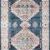 Heidi Denim / Blush rug runner with elongated shape featuring repeating medallions on denim background