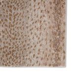 Close-up corner highlighting plush metallic texture with varying spot sizes and well-defined edges