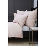 Close-up side view of two Waverly Big Pillows on bed with visible flange and fabric texture