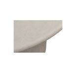 Close-up of the textured, plaster-like surface and rounded edge of the concrete tabletop