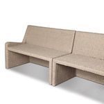 Back view showing full length and height of banquette's woven rattan frame