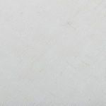 Close-up of smooth white fabric lamp shade texture with subtle weave