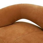 Close-up of backrest curve showing continuous leather surface without visible cushioning