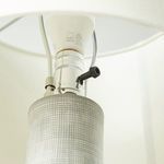 Close-up of lamp base lines with visible hand-painted texture and subtle color variations.