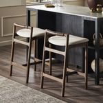Pair of Baden Bar Stools positioned by black island with marble countertop