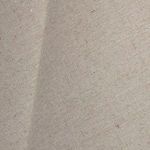Close-up showing linen fabric texture with fine weave and natural beige tone