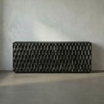 Black Walnut sideboard with vertically carved wave facade concealing three drawers and two doors