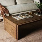 Side angle of Henry Coffee Table focusing on oak finish and natural wood grain variations