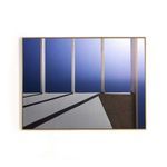 Abstract photograph with vertical white beams casting shadows on a blue to gray gradient background, framed in vertical gr...