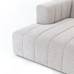 Side view close-up of sectional showing vertical channel tufting on back and cushions