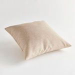 Side angle view showing pillow thickness and textured weave of Blake Square Pillow