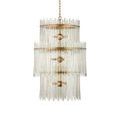Close detail of smooth and textured variations in clear glass bars attached vertically to shiny gold metal rings