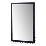 Side angled view of rectangular mirror highlighting finials on black iron frame