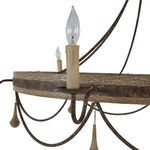 Close-up of candle-style light bulb holder with curved metal arm and distressed wooden ring