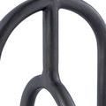 Detailed view of matte black nickel finish with subtle textures on table’s aluminum legs