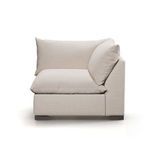 Opposite side view with cushions leaning against the armrest and plush seat cushion